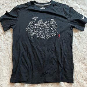 NWOT Nike Tokyo Dancing S-M Black Tee